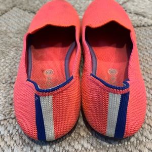 Rothy’s used The Kids Loafer in Flamingo.